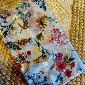 Cotton scarf with fringe edging. Lovely spring colors.